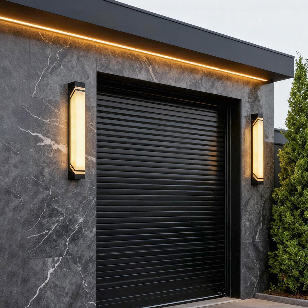 Exterior wall lights black with alabaster stone shade create a warm ambient glow while adding elegant texture to modern facades.