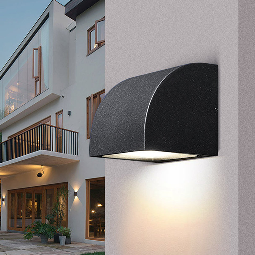 Classic bronze wall light with frosted glass shade in traditional lantern design
