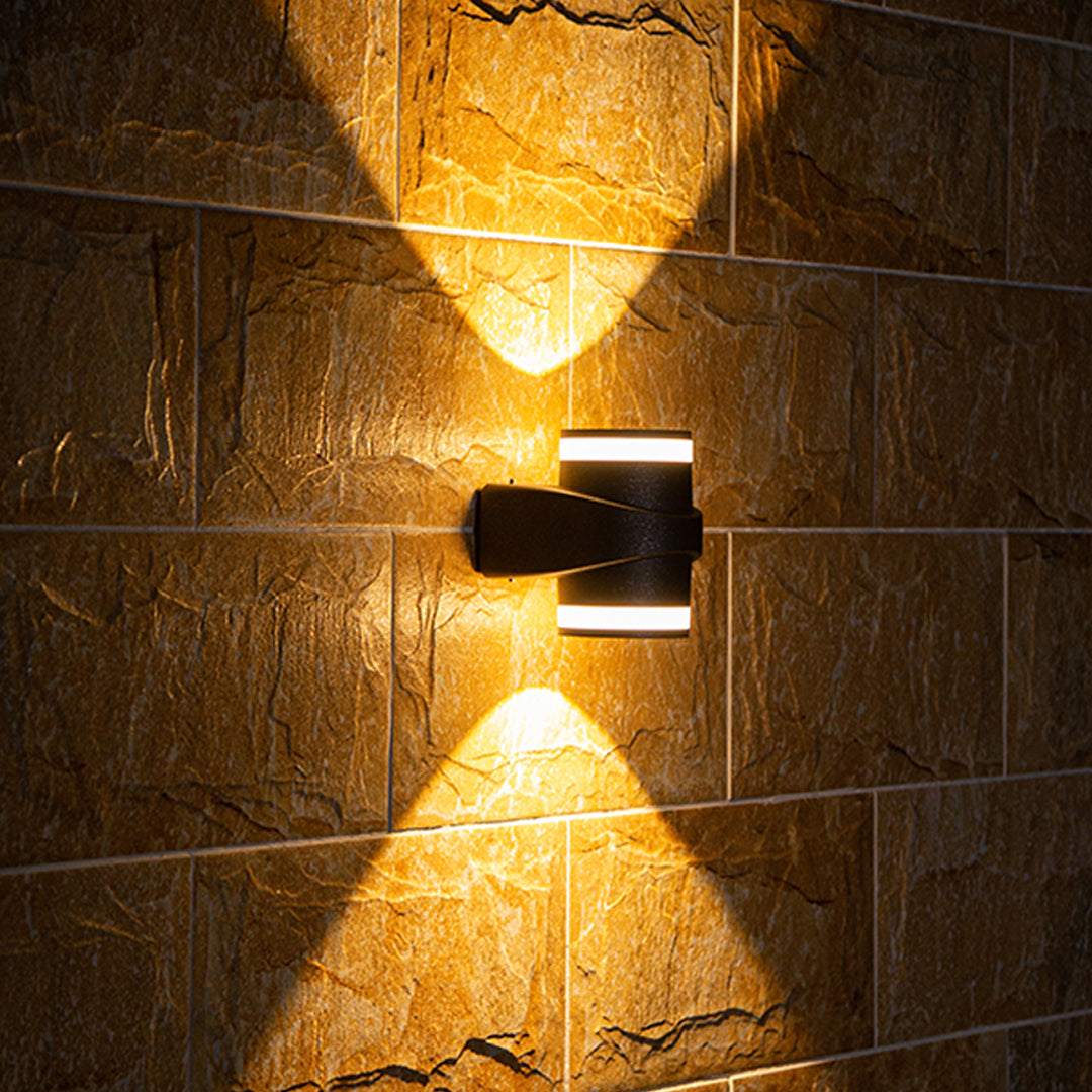 Sleek black angular wall light fixture with modern minimalist aesthetic