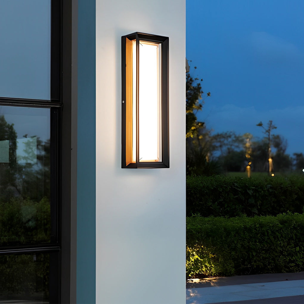 Fan shaped wall sconce with a modern design, providing ambient light in a hallway.