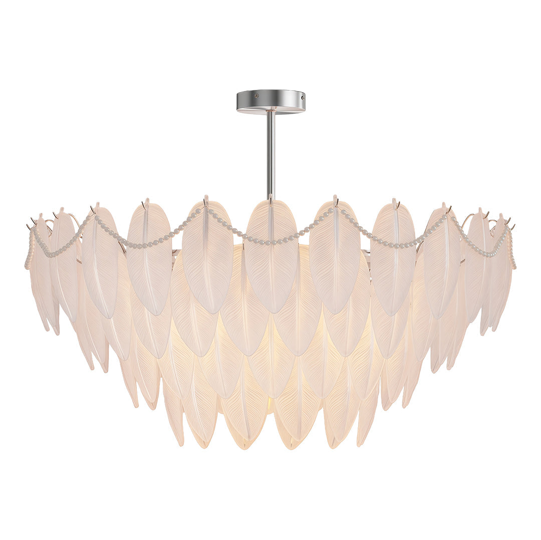 Feathers chandelier creating focal point in sophisticated living room with botanical artwork