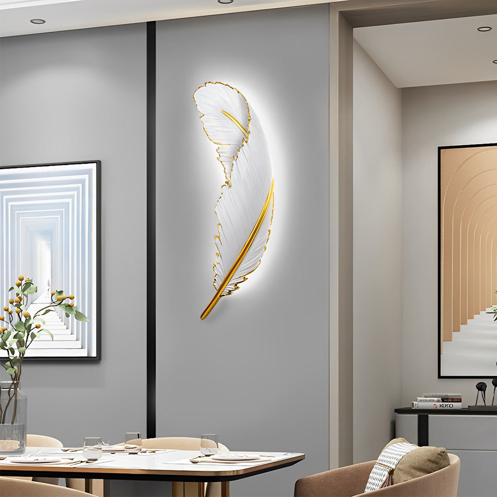 Feather LED wall lamp with a golden outline, providing ambient light in a hallway.