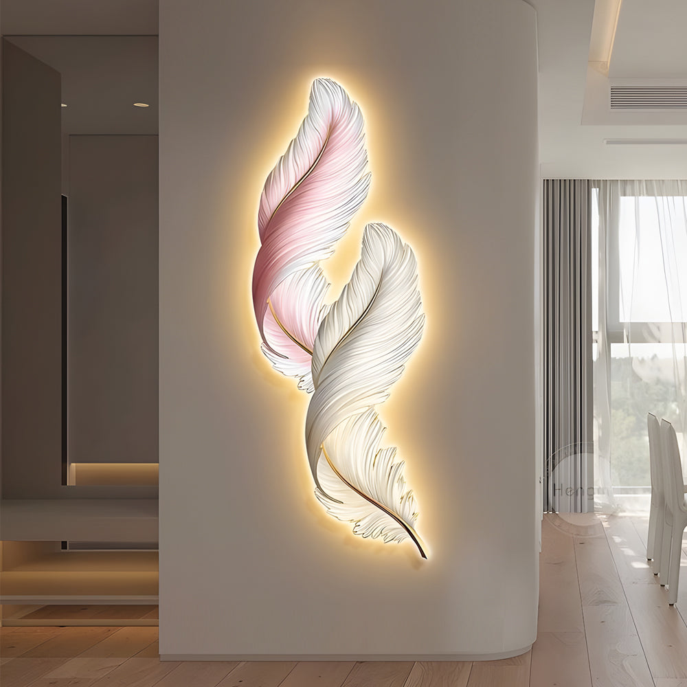 Modern feather wall decor light glowing on a feature wall, enhancing interior depth with soft layered light.