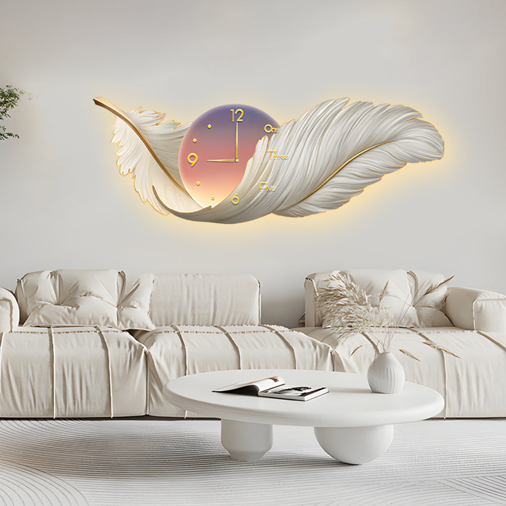 Elegant feather wall lamp with clock detail mounted above a sofa, combining decor and functional lighting.