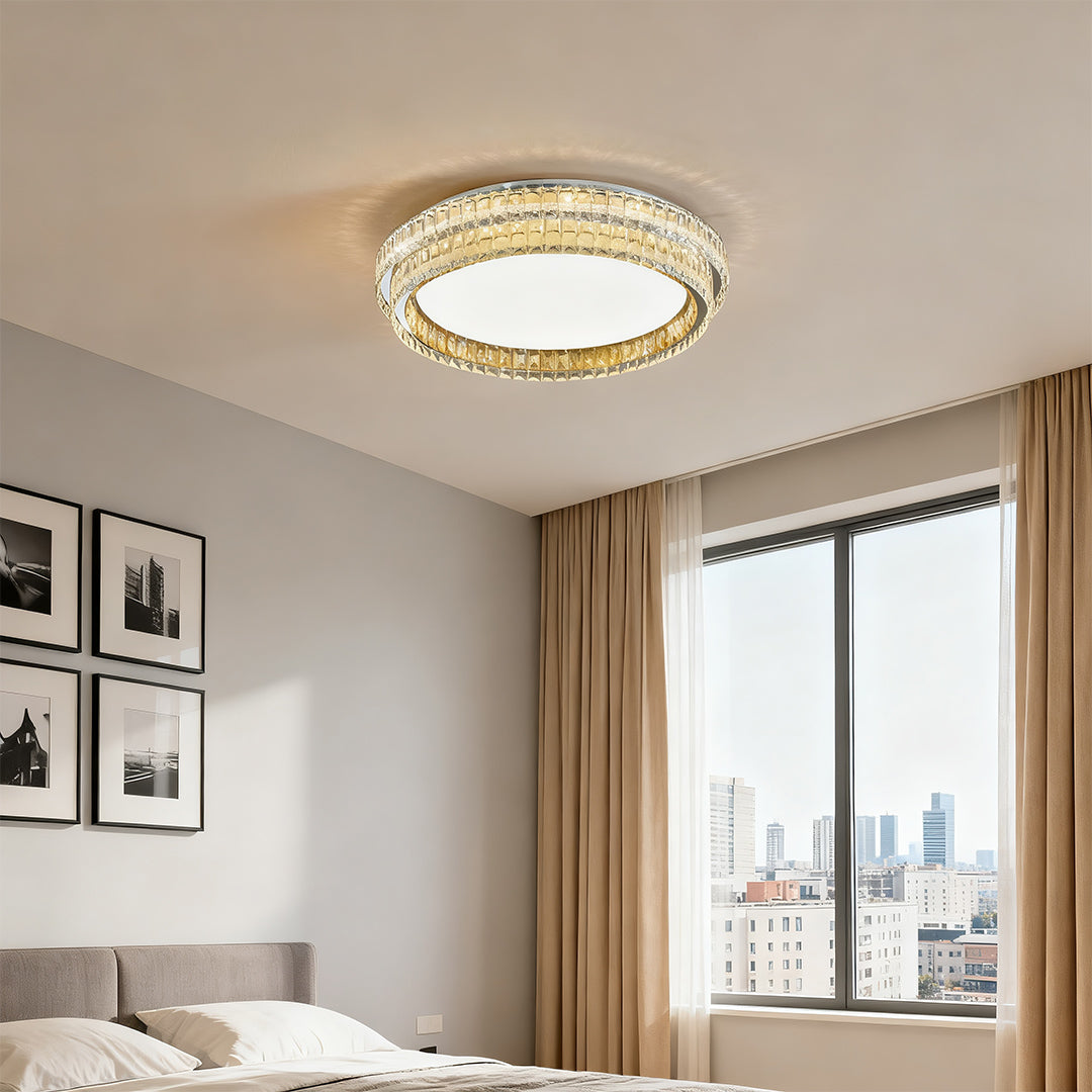 Flush mount modern light providing warm illumination in a modern bedroom setting.