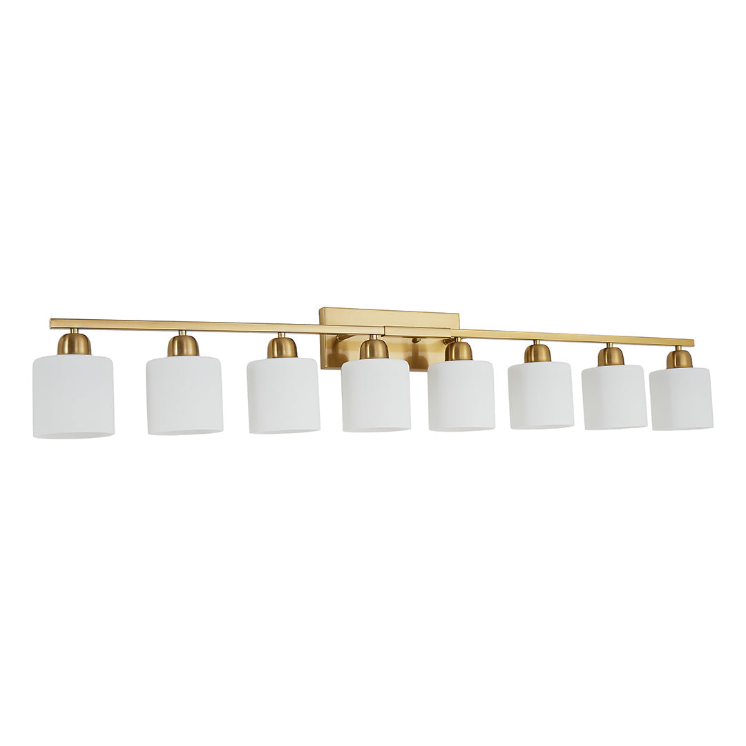 Modern bathroom vanity light with four sleek bulbs, installed above a double sink with a large mirror.