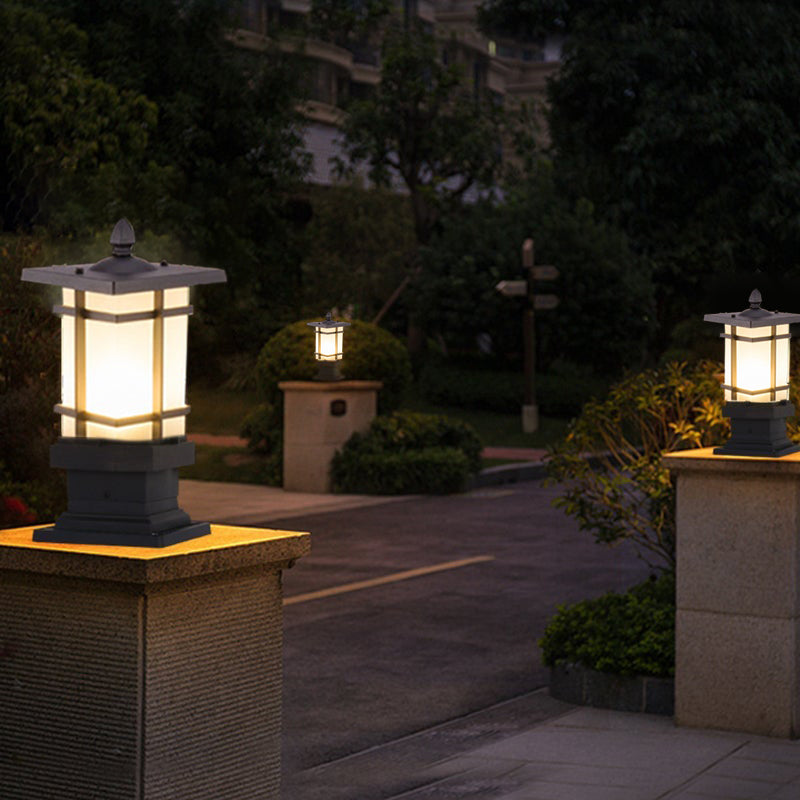 Garden bollard lighting with a close-up of its illuminated square design.