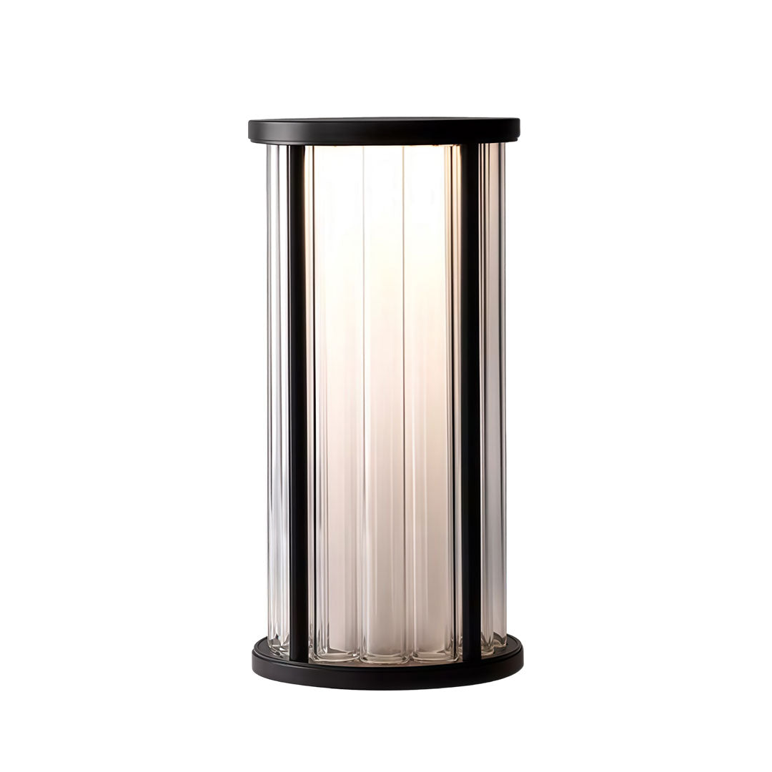 Garden bollard lighting with a contemporary design, illuminating a garden pathway.