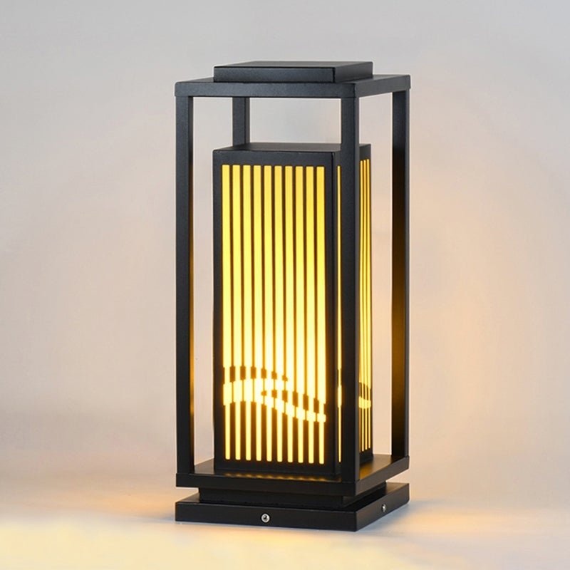 Garden bollards lights with a minimalist design, enhancing a modern landscape.