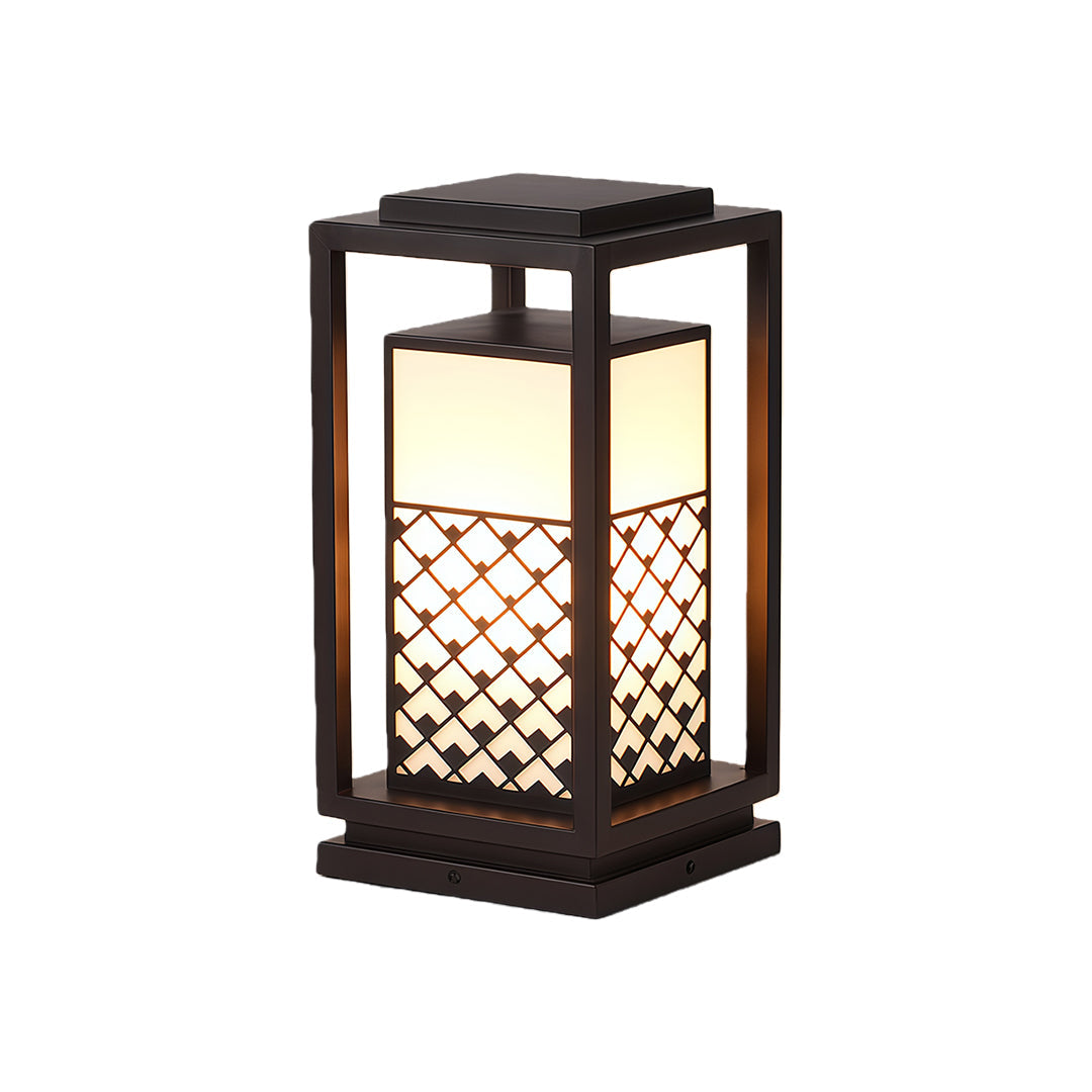 Bollard light fixture placed along a garden path, offering elegant lighting and decorative appeal with its unique design.