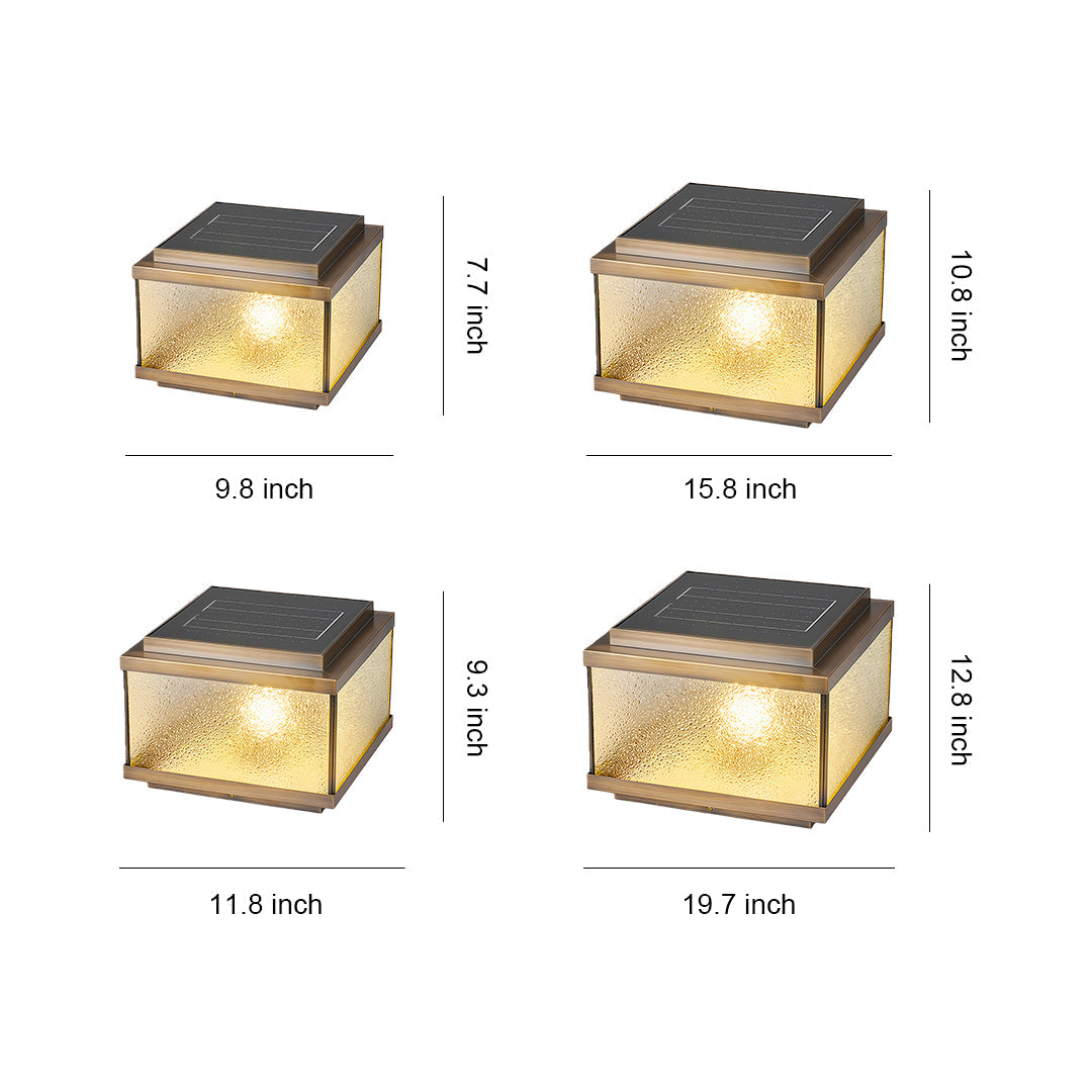 Garden pillar lights design reference showing four amber-glowing square post lamps with textured glass panels.