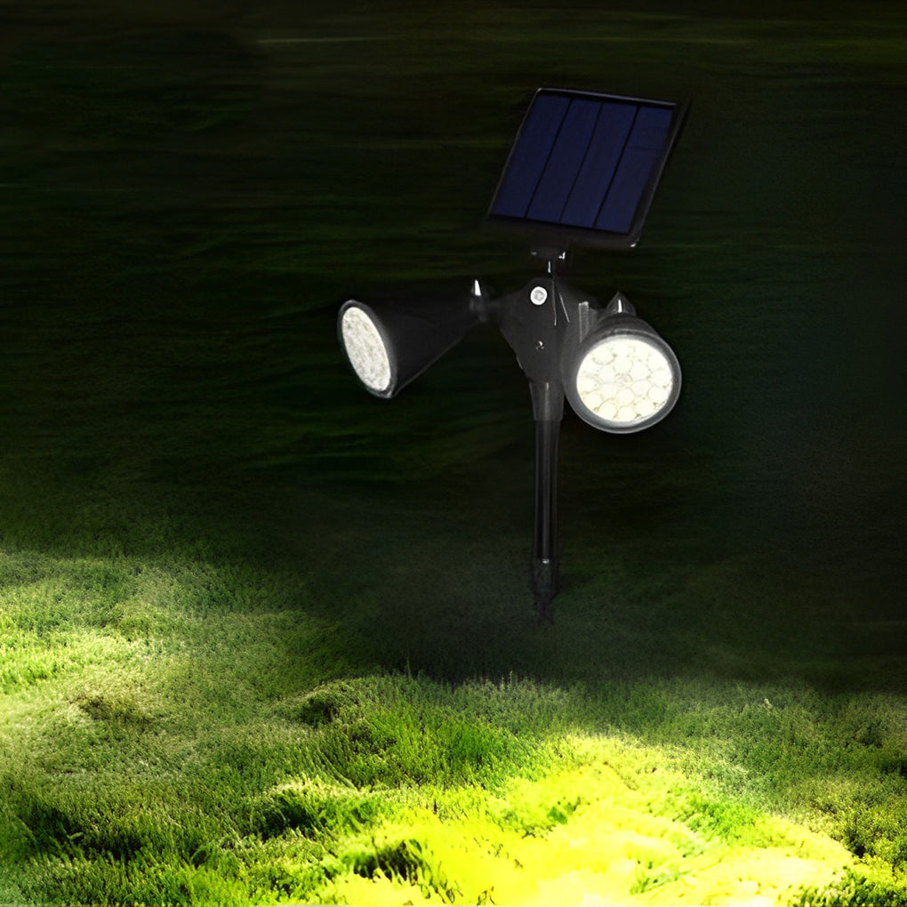 Garden spotlights solar powered with a close-up of the illuminated solar panel.