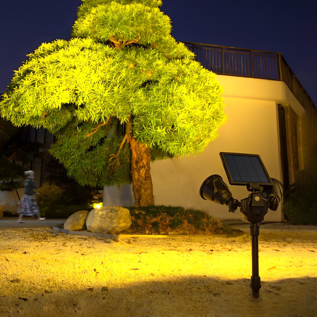 Garden spotlights solar powered enhancing a landscaped garden with bright, eco-friendly lighting.