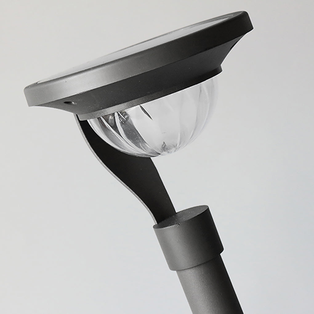 Garden stake solar lights with a close-up of the solar panel and light.
