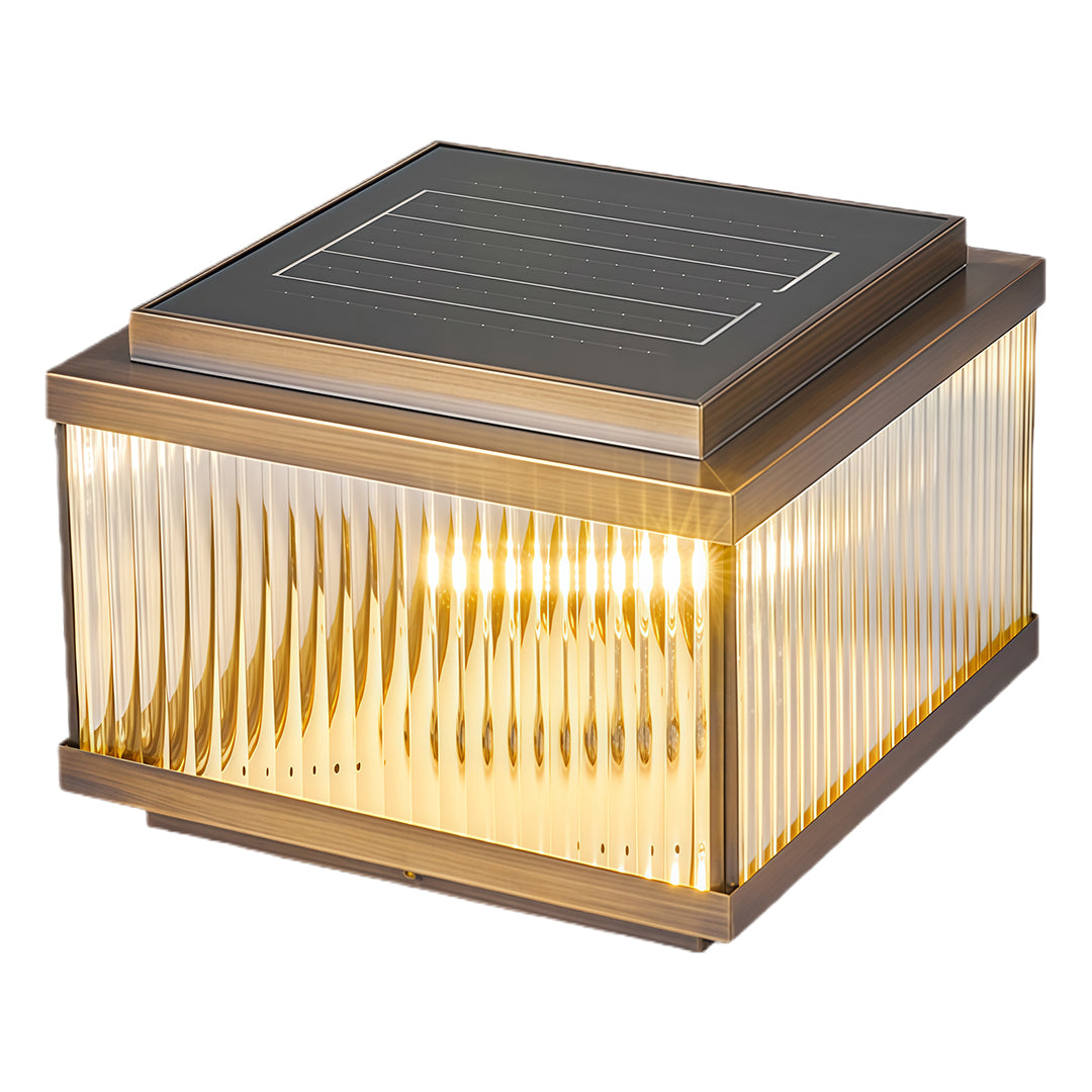 Contemporary square copper pillar light with geometric ribbed glass and sleek dark metal cap.