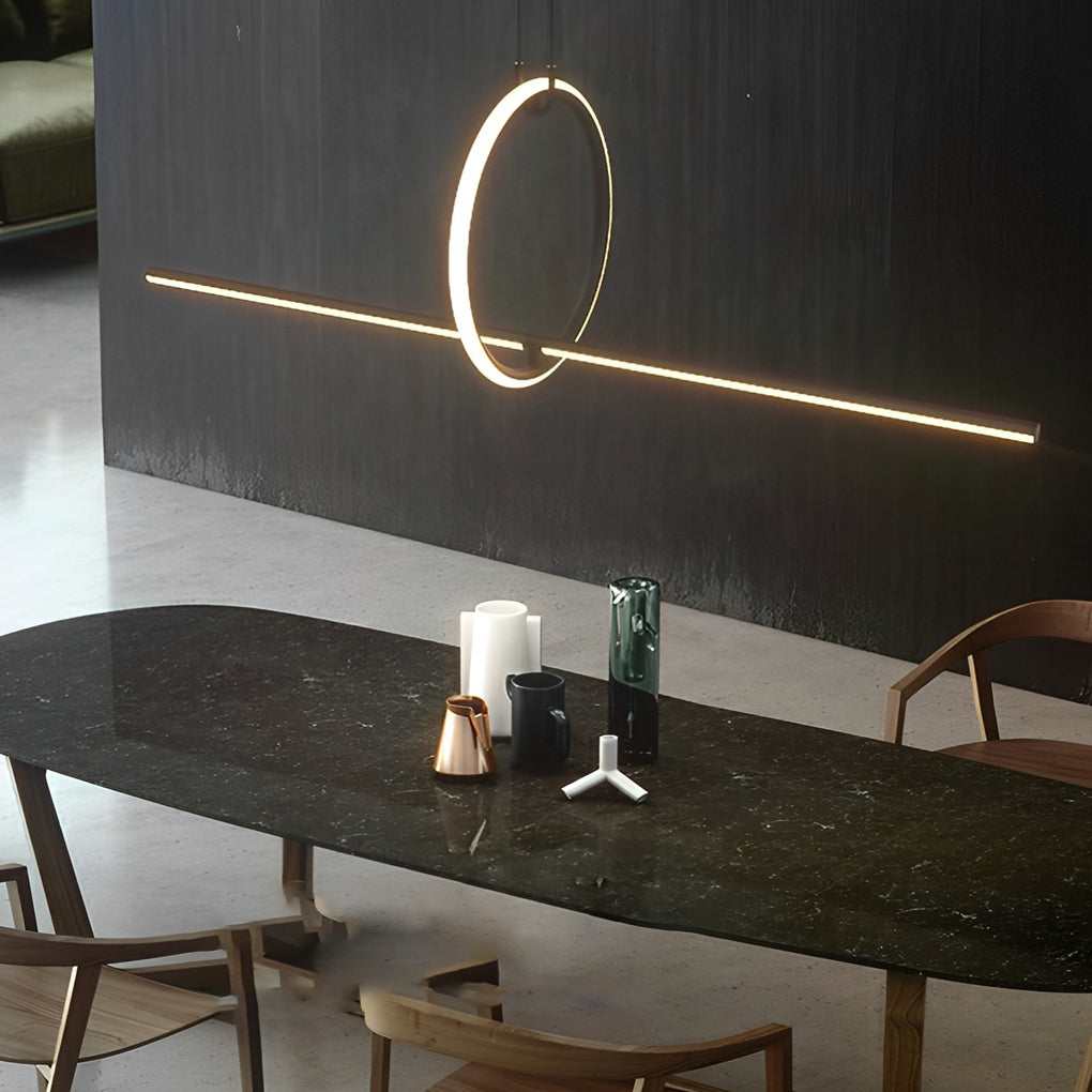 Close-up of a geometric pendant light fixture, showcasing its circular design and integrated LED lighting.