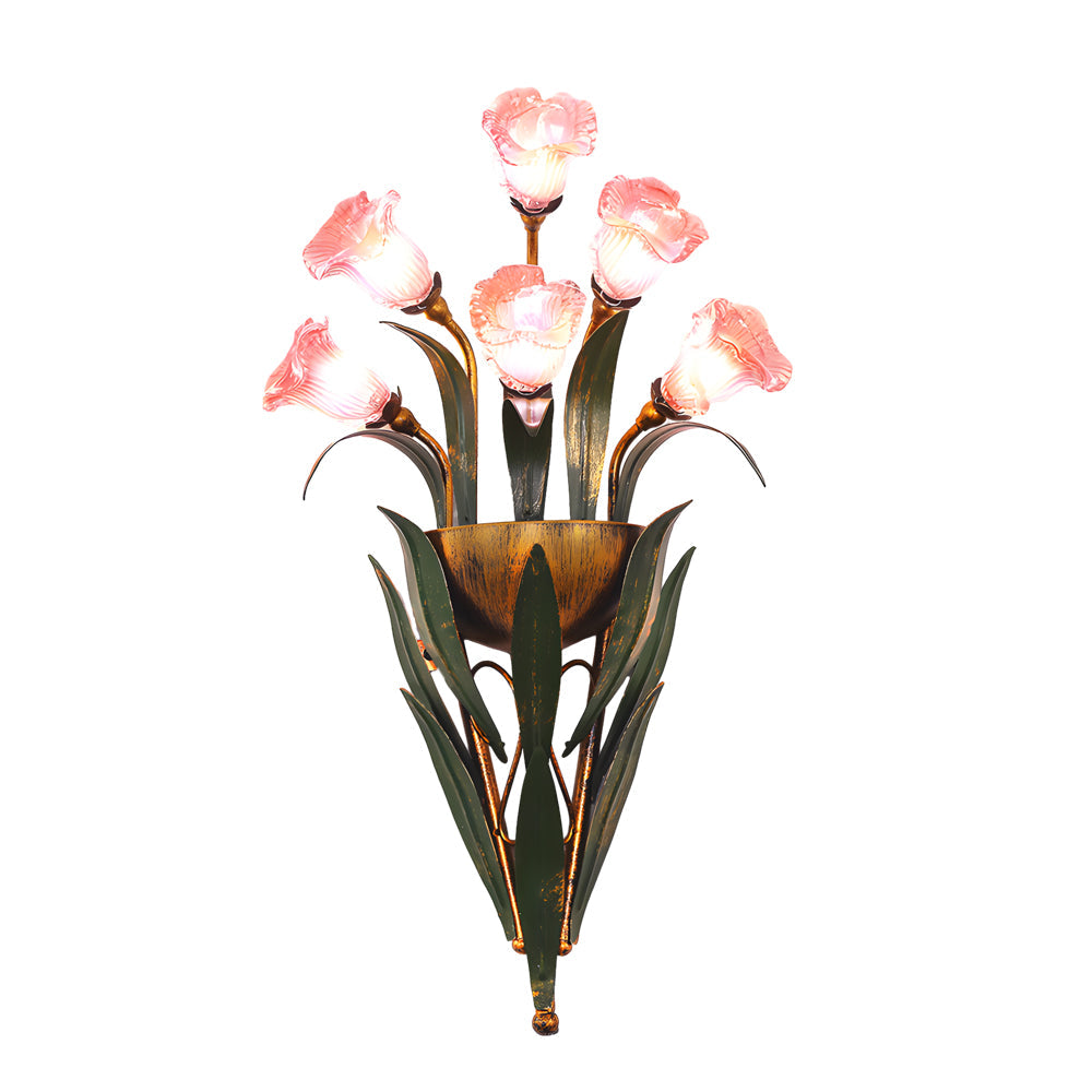 Glass flower sconce with white flowers, providing ambient lighting in a modern setting.
