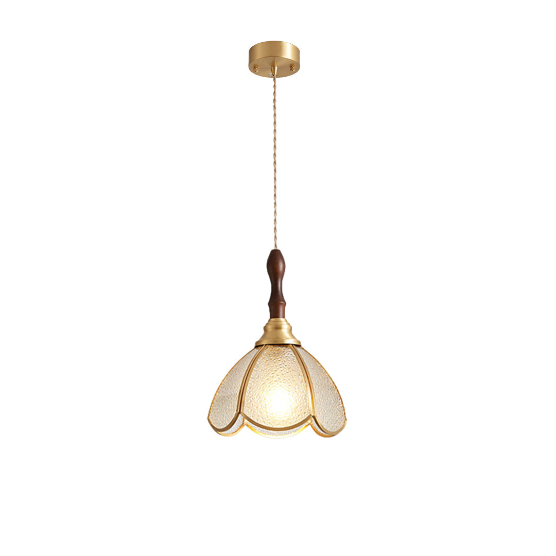 Single glass pendant light with a gold frame, showcasing intricate floral glass design.