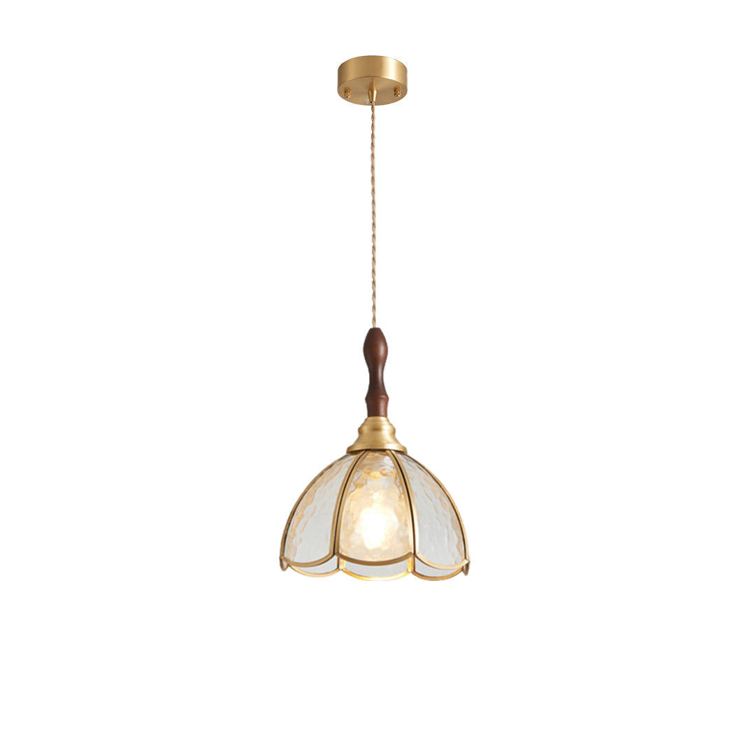 Cluster of glass pendant lights with gold frames, adding charm to a modern bedroom setting.