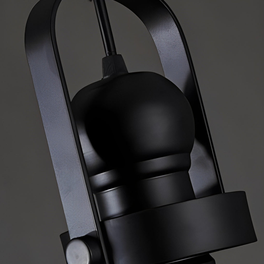Glass pendant lights kitchen close-up showing curved metal frame and hanging structure detail.