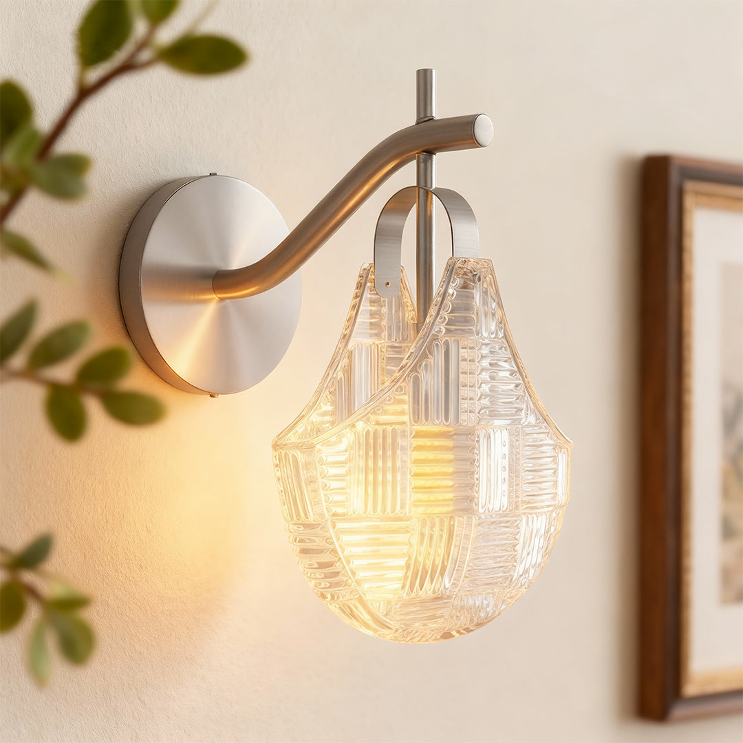 Modern luxury chandeliers style glass wall sconces close-up with brass and textured glass detail