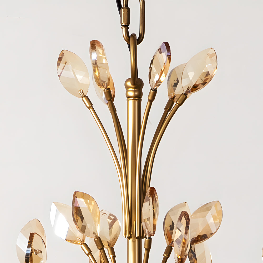 Gold candlestick chandelier with a classic design, illuminating a modern interior.