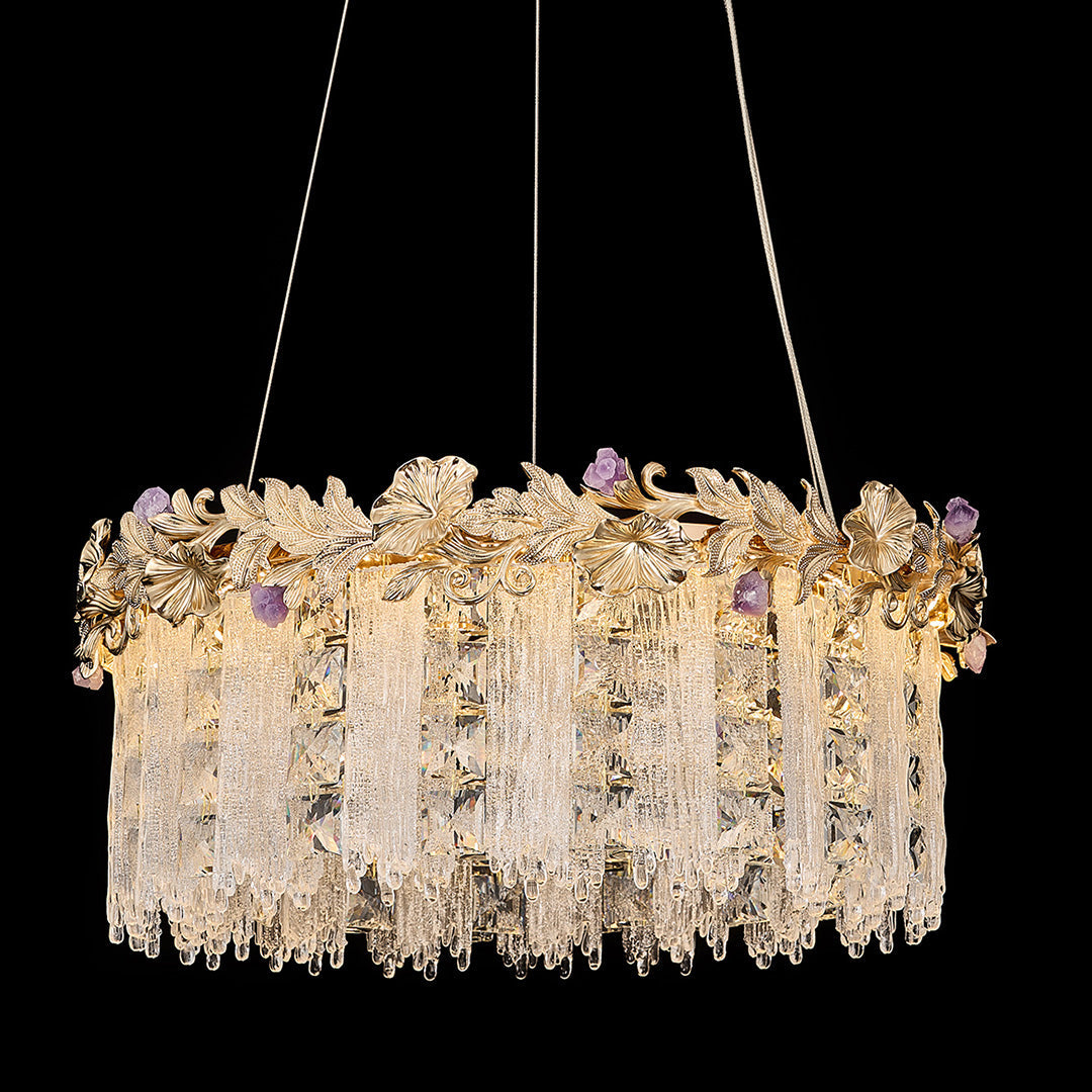 Black background showcasing gold chandelier crystal with sparkling detail.