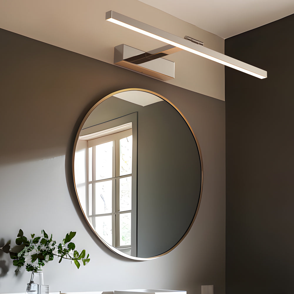 Gold light bars for bathroom vanity installed above a round mirror for soft, balanced lighting