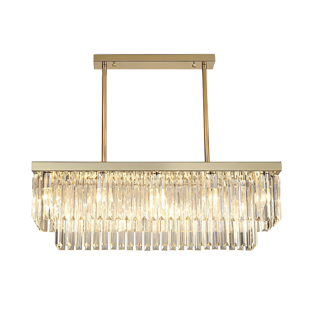 Gold rectangular chandelier providing soft illumination in a stylish dining room.