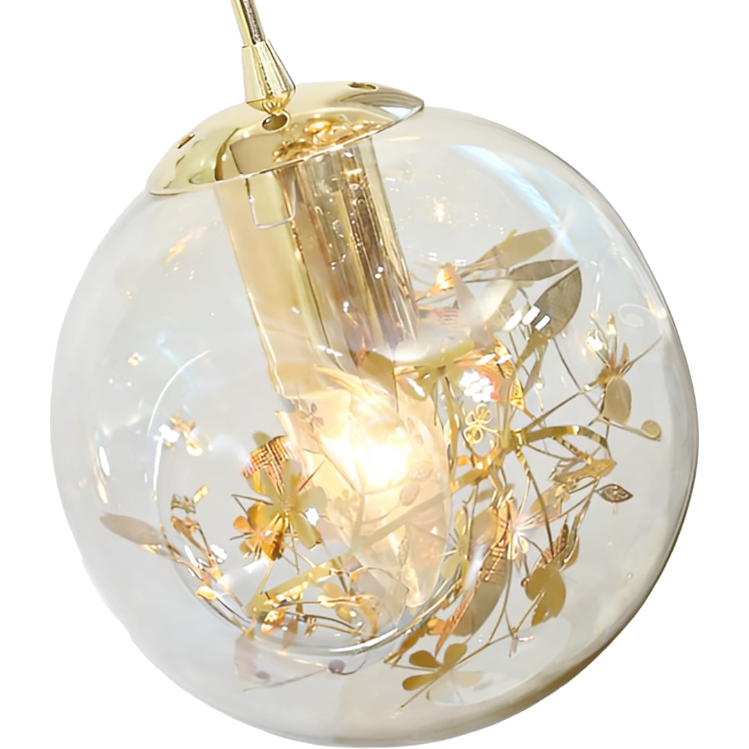 Gold staircase chandelier with a minimalist design, providing elegant light in a staircase area.