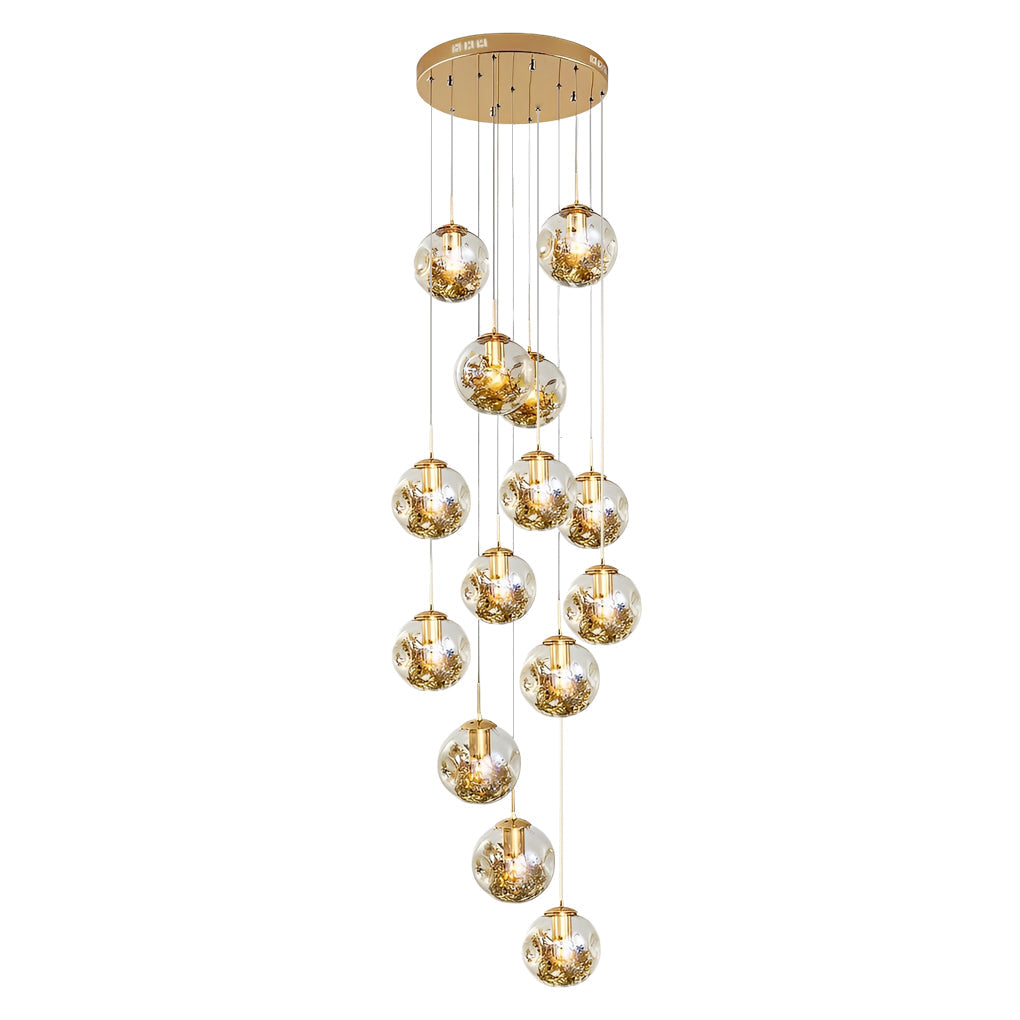 Gold staircase chandelier with a modern design, providing soft illumination in a hallway.