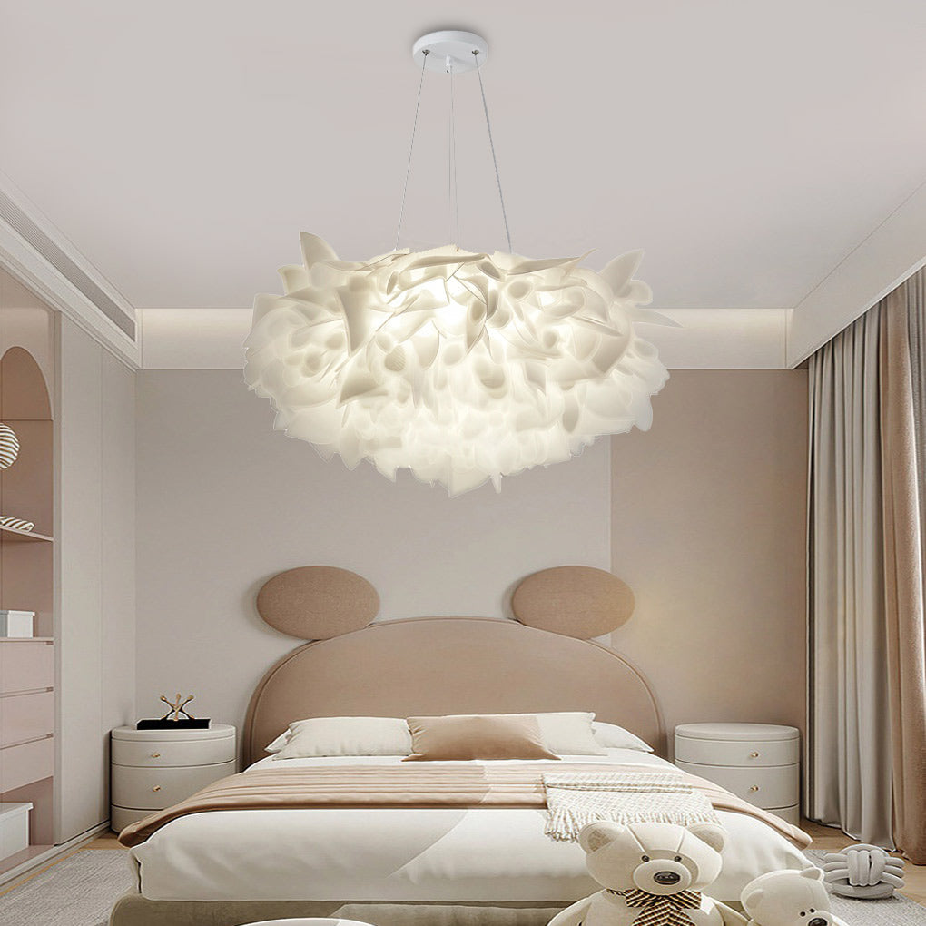 Hanging petal light providing soft lighting in a modern bedroom with neutral tones.