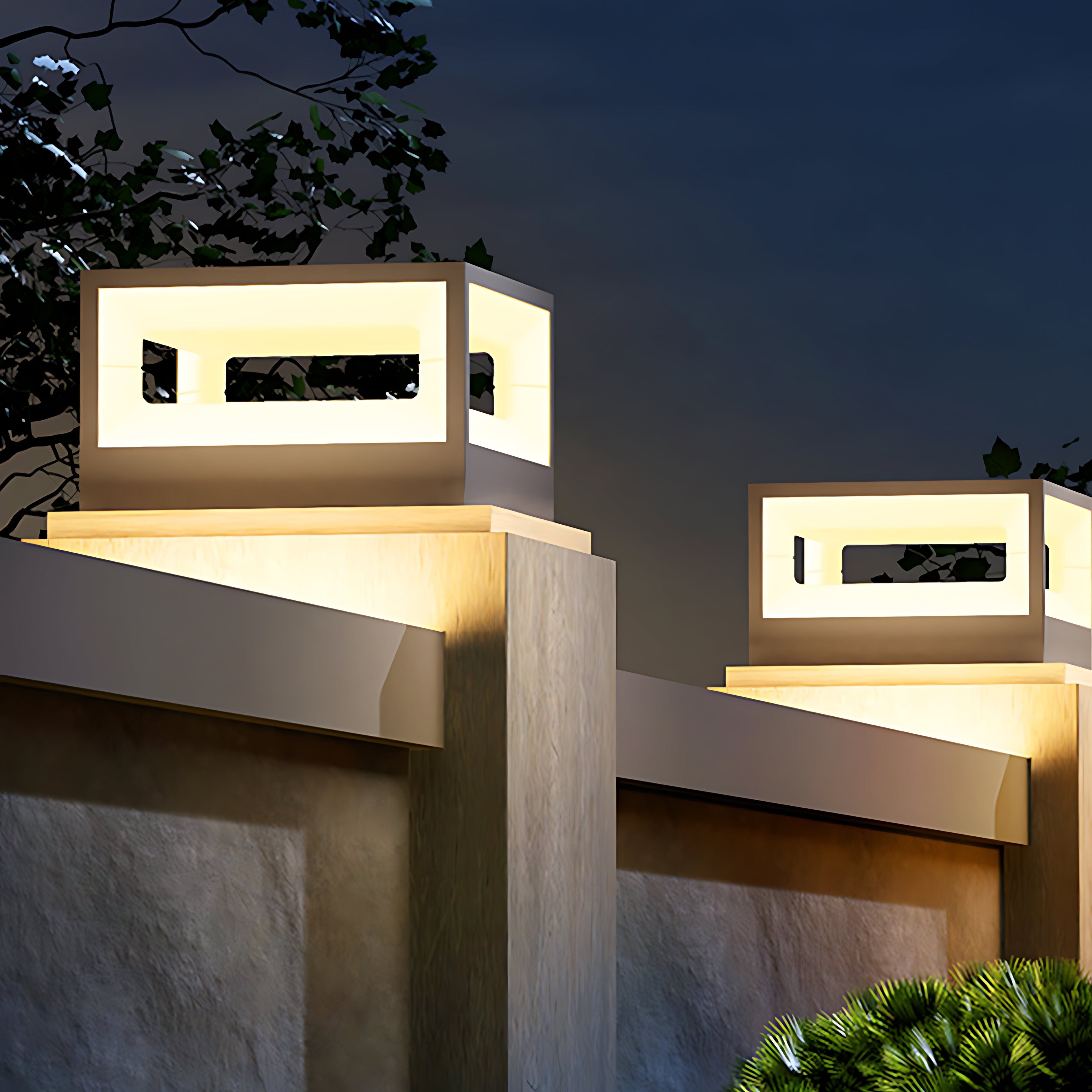 Hollow square pillar light near a fence, enhancing the outdoor ambiance with soft lighting.