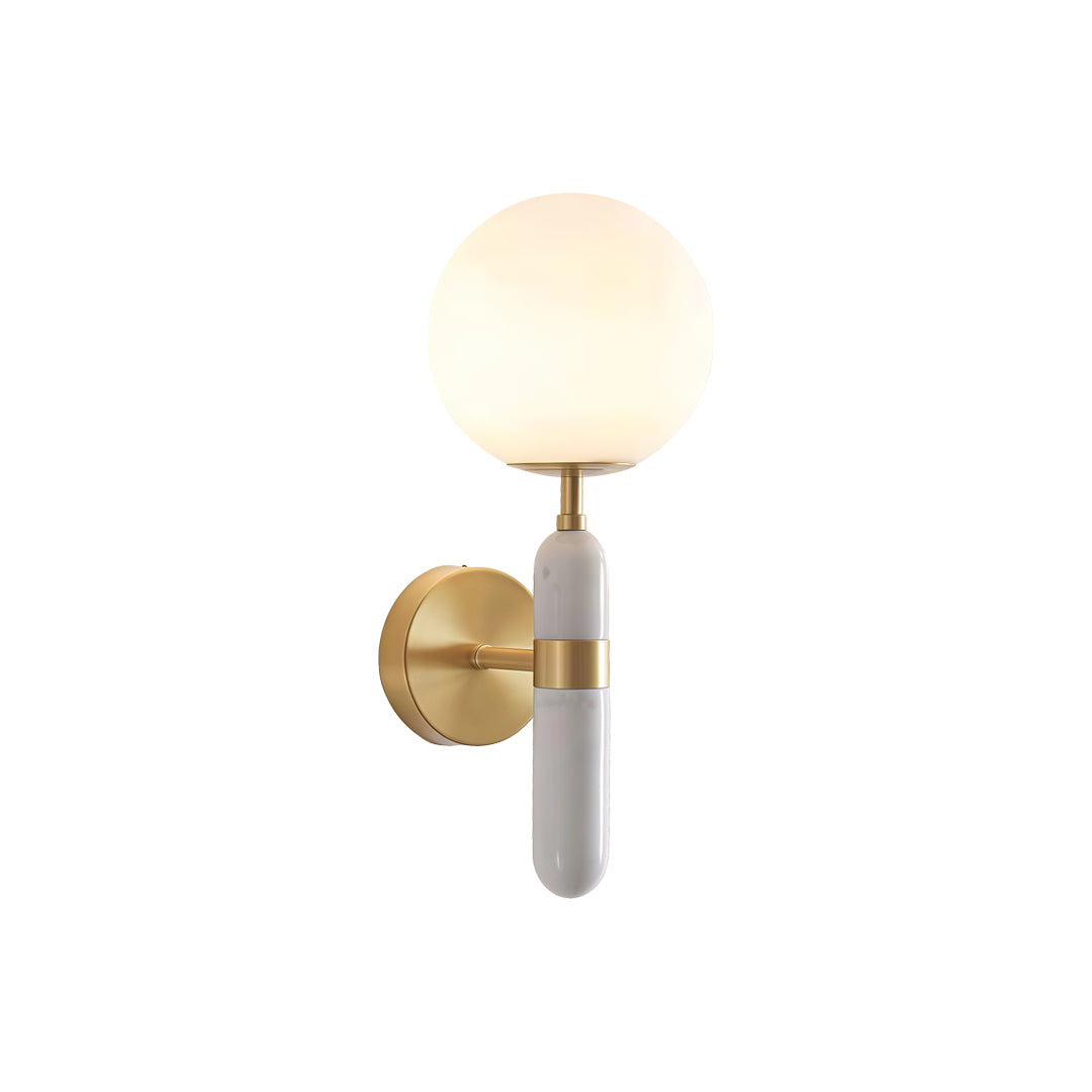 Isolated gold wall sconce lighting indoor spotlight lamp with globe diffuser and sleek modern design.