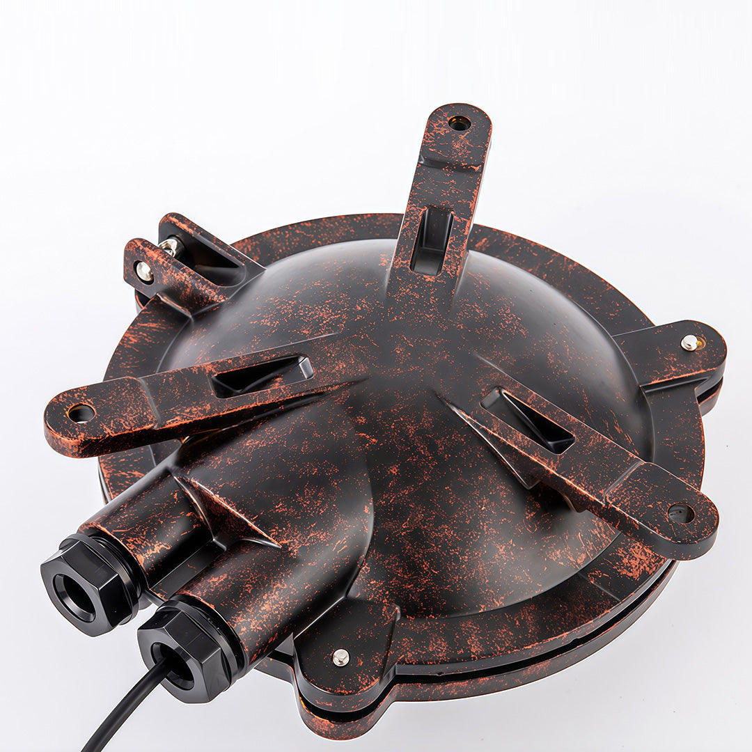 Back view of industrial outdoor sconce showing mounting plate hardware and aged bronze patina finish