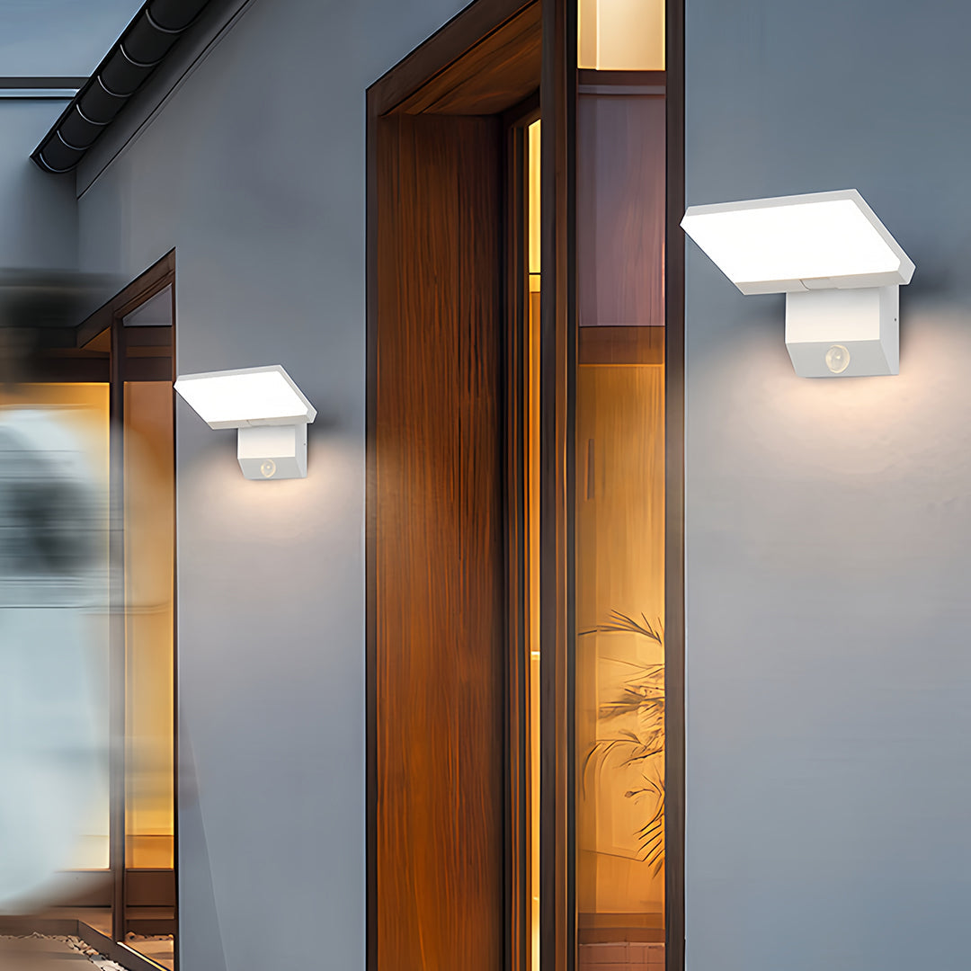 Industrial wall lights providing architectural accent lighting on contemporary wooden facade entrance