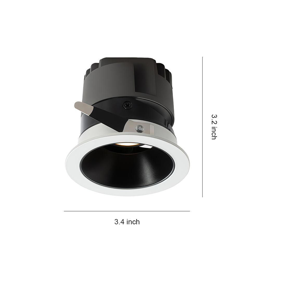 Interior spotlights with white trim and deep black reflector, glass shade chandelier inspired recessed design for directional accent lighting.