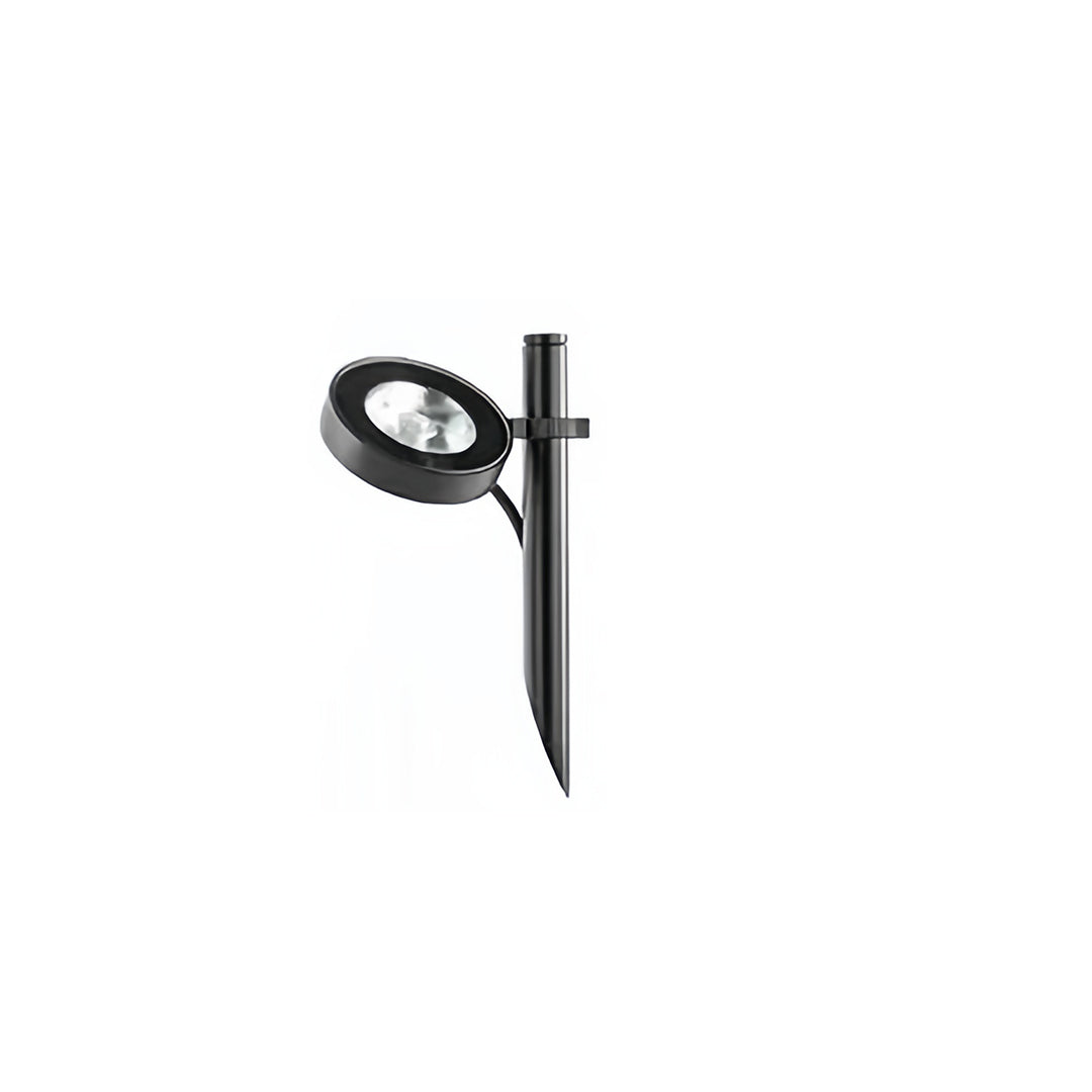 Isolated black single-head pathway landscape lights with a ground stake mount, ideal for focused accent lighting in garden beds.