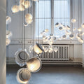 Nordic luxury jellyfish pendant light crafted from glass, creating a soft ambient glow and an artistic focal point for modern interiors.