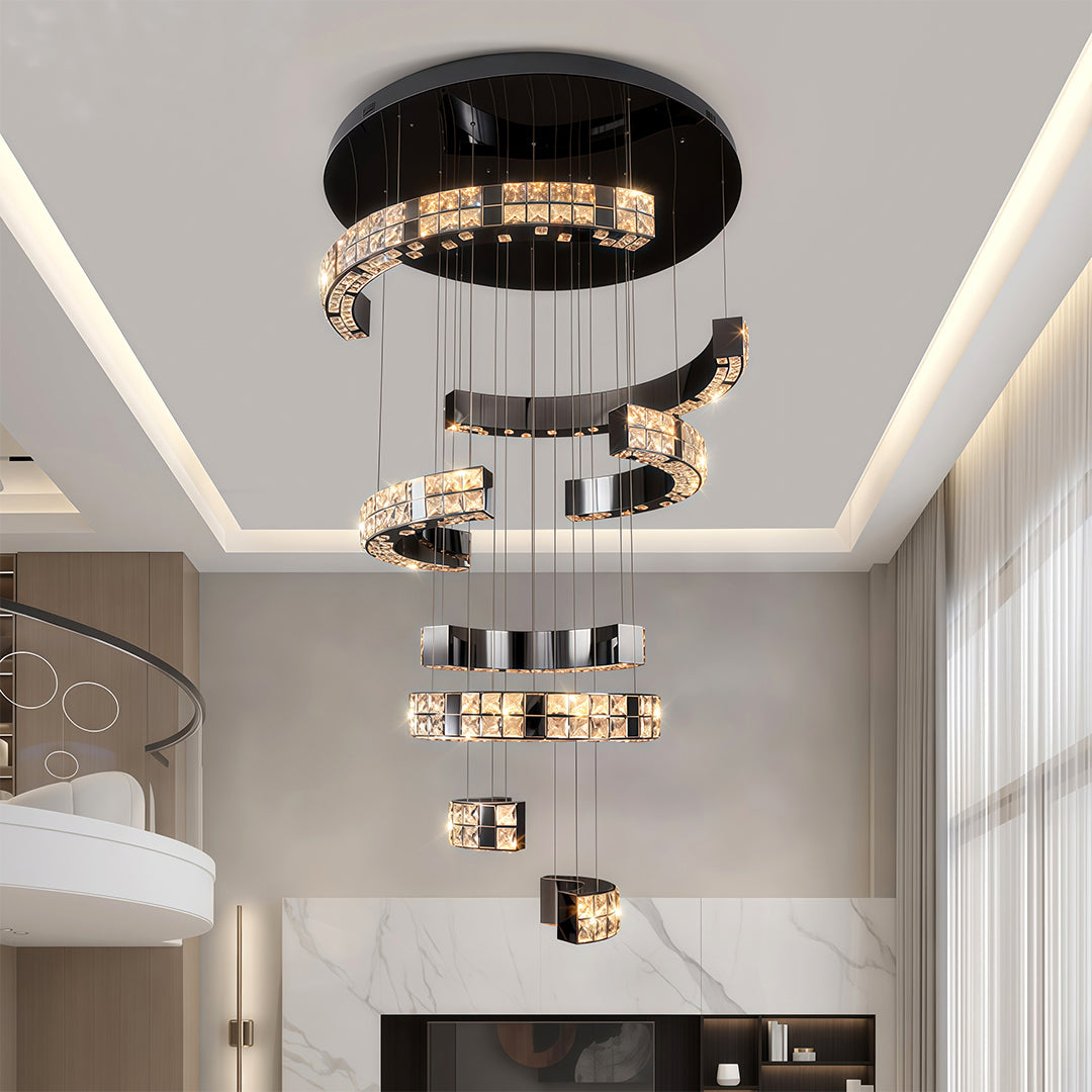 Modern K9 crystal chandelier hanging in a bright living area.