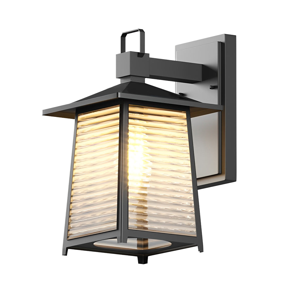Lantern outdoor wall light with horizontal glass slats, casting a warm glow on a textured wall.