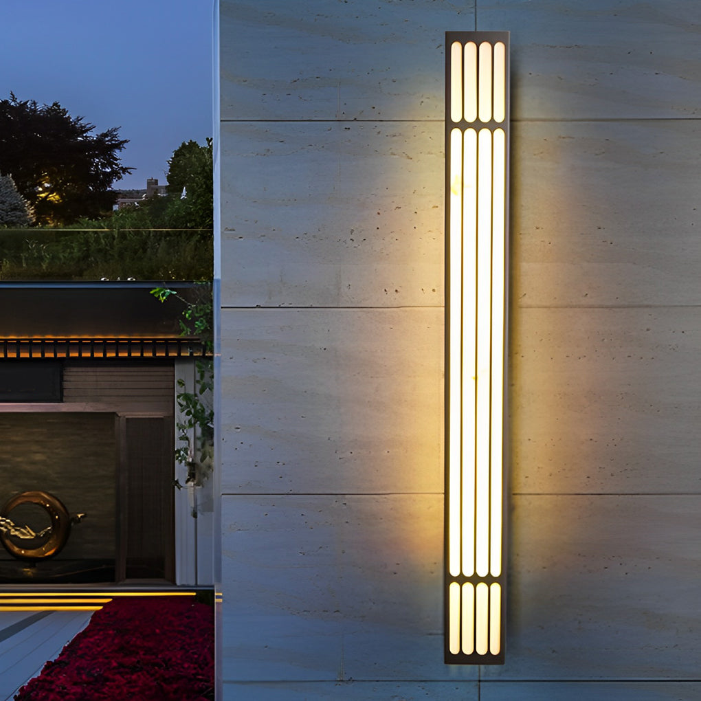 Large outdoor wall light illuminating a modern outdoor space with sleek design.