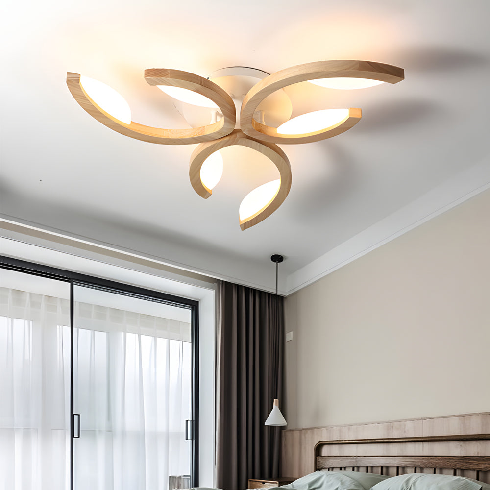 Minimalist interior featuring a decorative leaf ceiling light that adds organic elegance and gentle illumination.