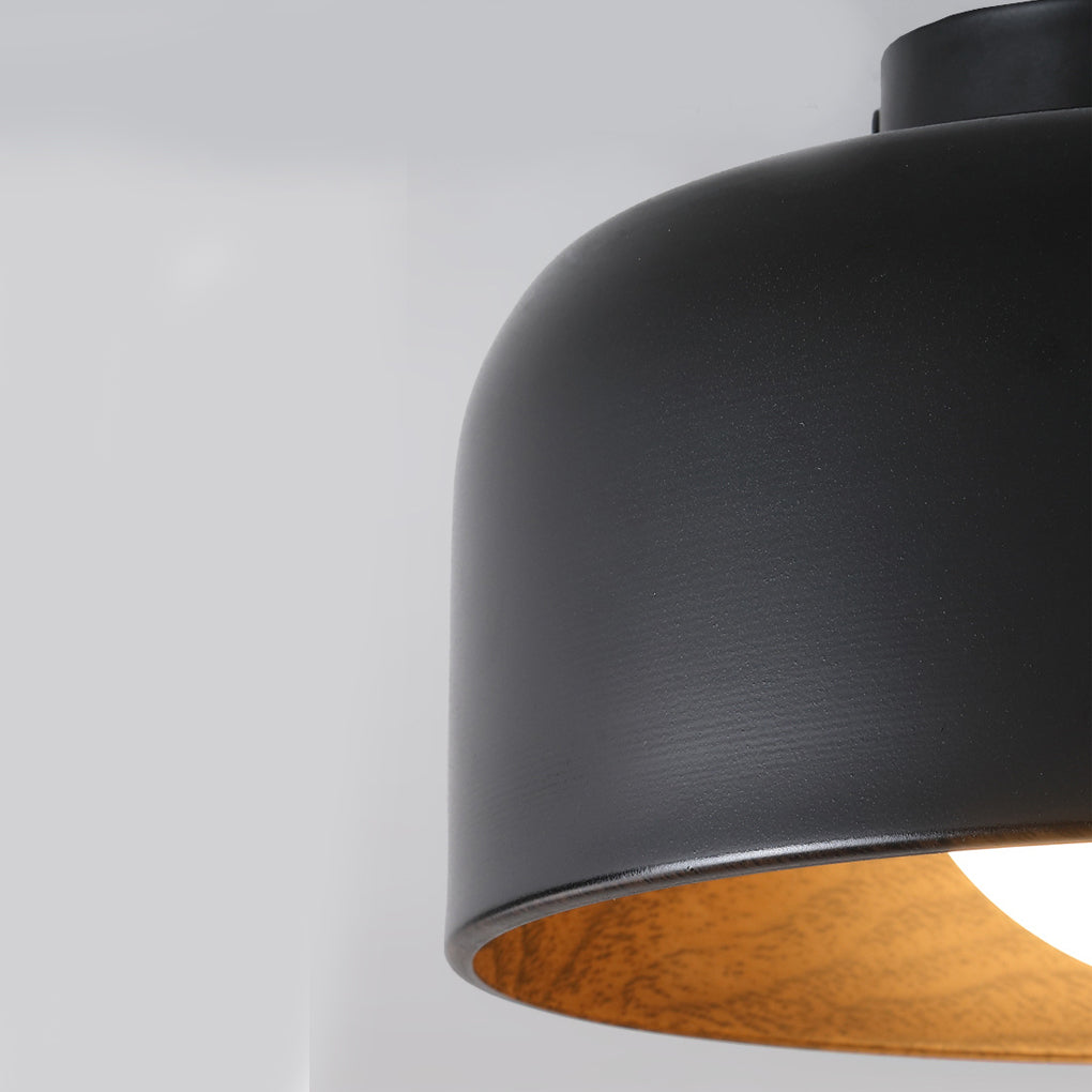 Close-up of an LED ceiling light with wood grain interior, showcasing its warm and inviting glow.