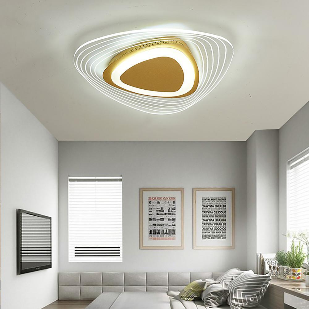 Triangle led ceiling lights installed in a bright modern living space.