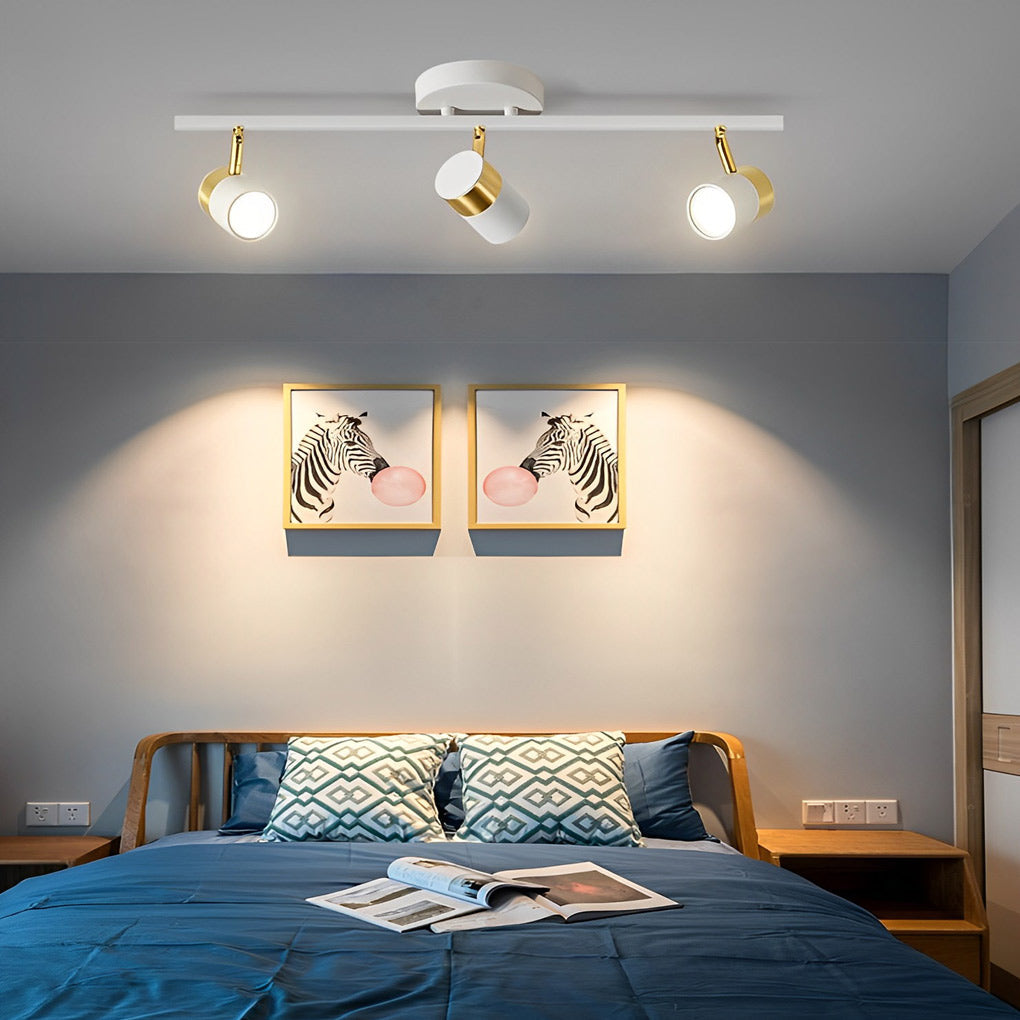 LED ceiling track spotlights with a minimalist black and gold finish, enhancing a stylish interior.