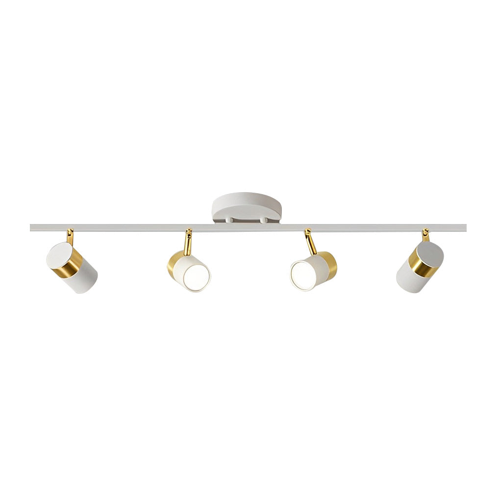 LED ceiling track spotlights with a white finish, illuminating a contemporary dining room.