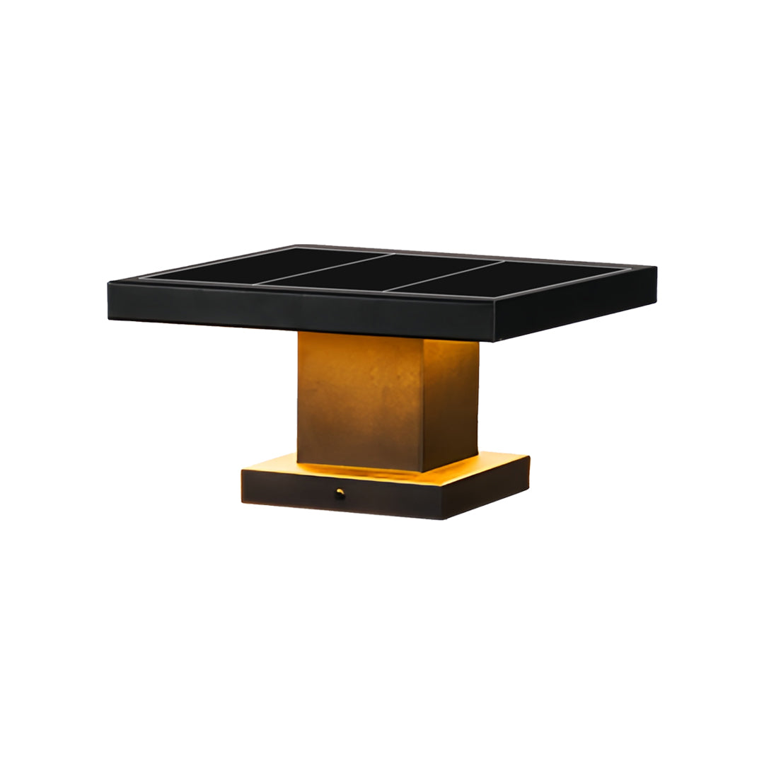 Compact led gate pillar light with structured black plate top and gold metallic center column.
