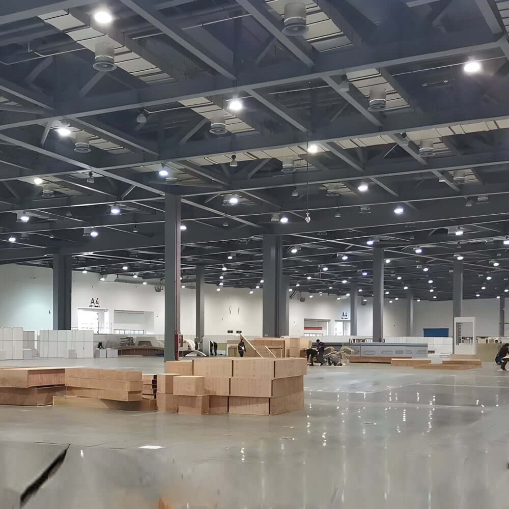 LED lamp for warehouse enhancing visibility in a clean, empty warehouse space.