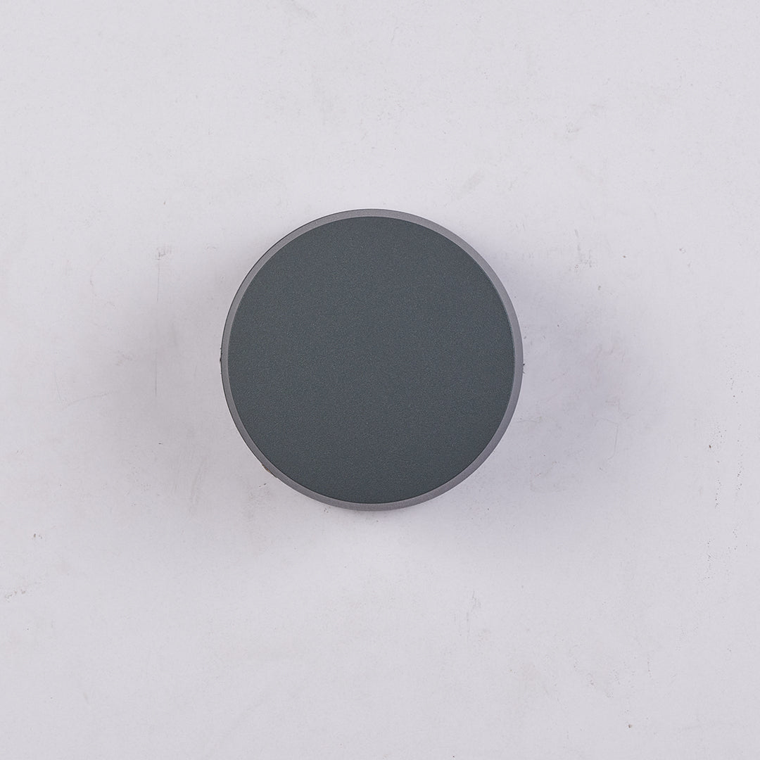 Top-down view of a circular LED outdoor landscape lights with a clean matte finish, designed for modern exterior spaces.